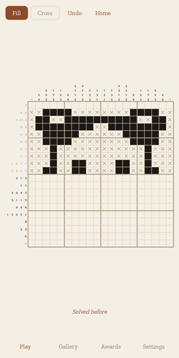 A twenty by twenty board part way through. The top nine rows are done and read as the ears and eyes of an animal; every finished row has crossed itself off, so the squares that cannot be filled are marked and the rest of the board is still blank.